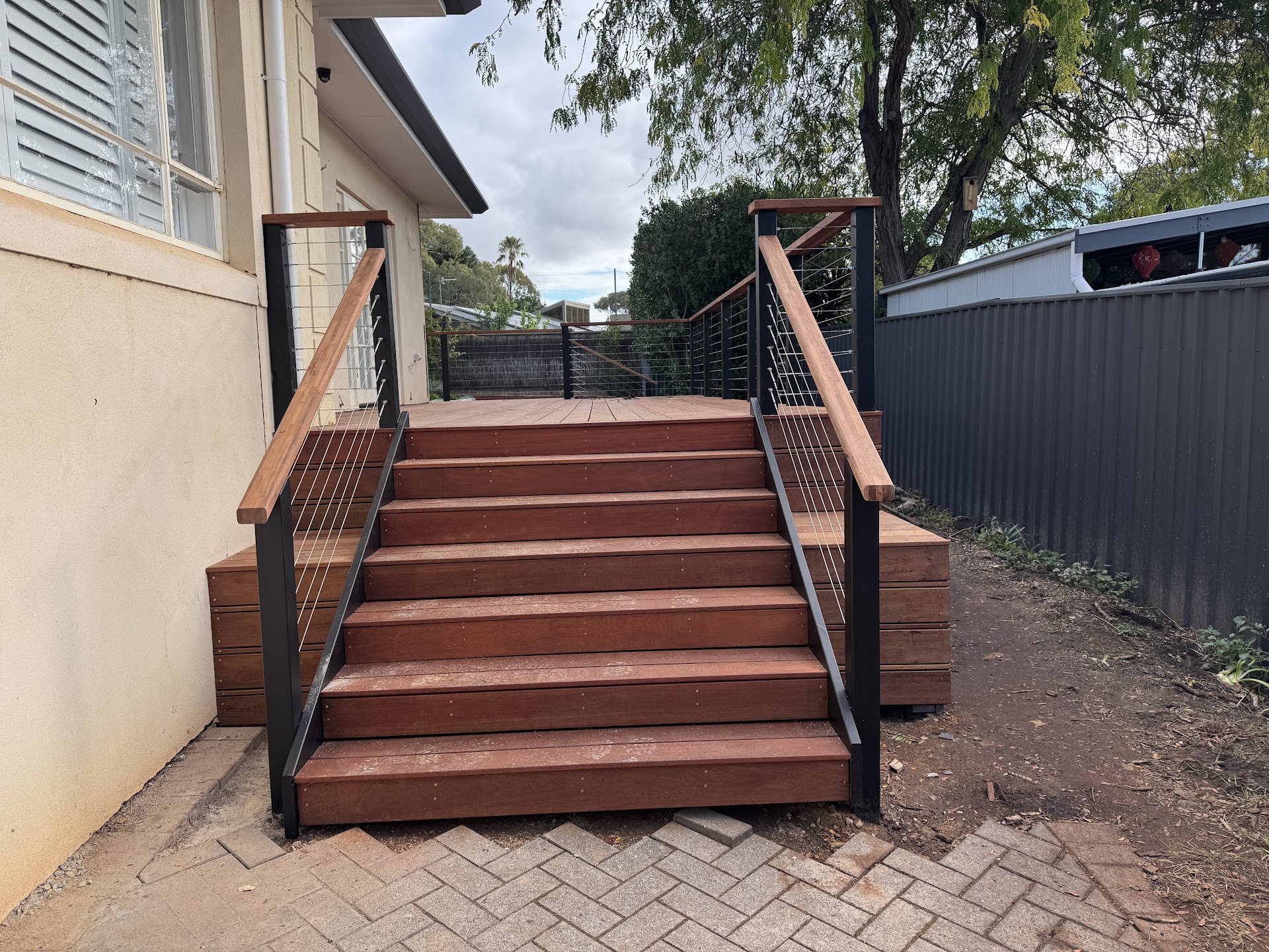 Completed timber deck and balustrade by MIC Building Services